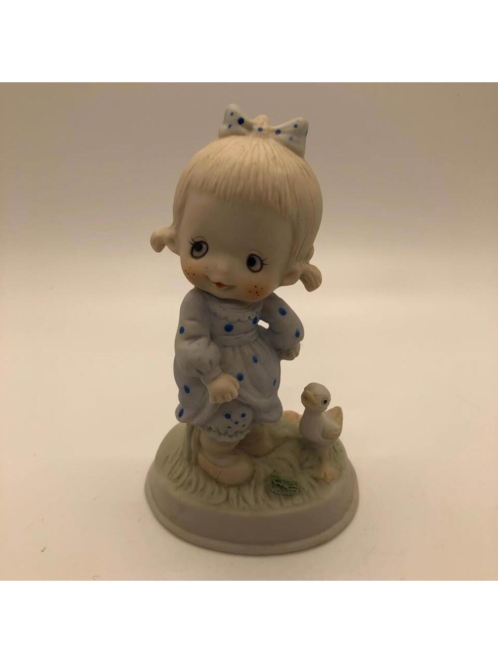 Duncan Royale girl with duck figurine